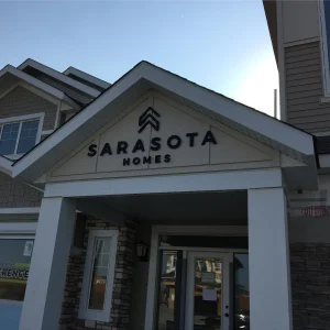 3D letter signage installed on a house for a developer showroom.